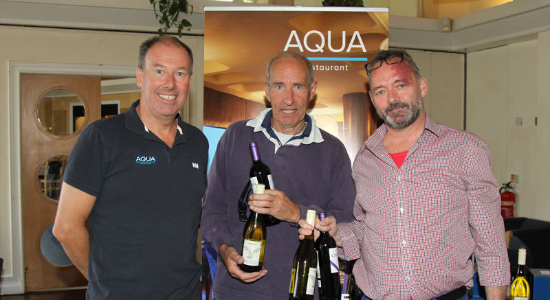 Commodore Brian Turvey with Richard McAllister (Force Five) and Aqua Restaurant's Dave Murnane