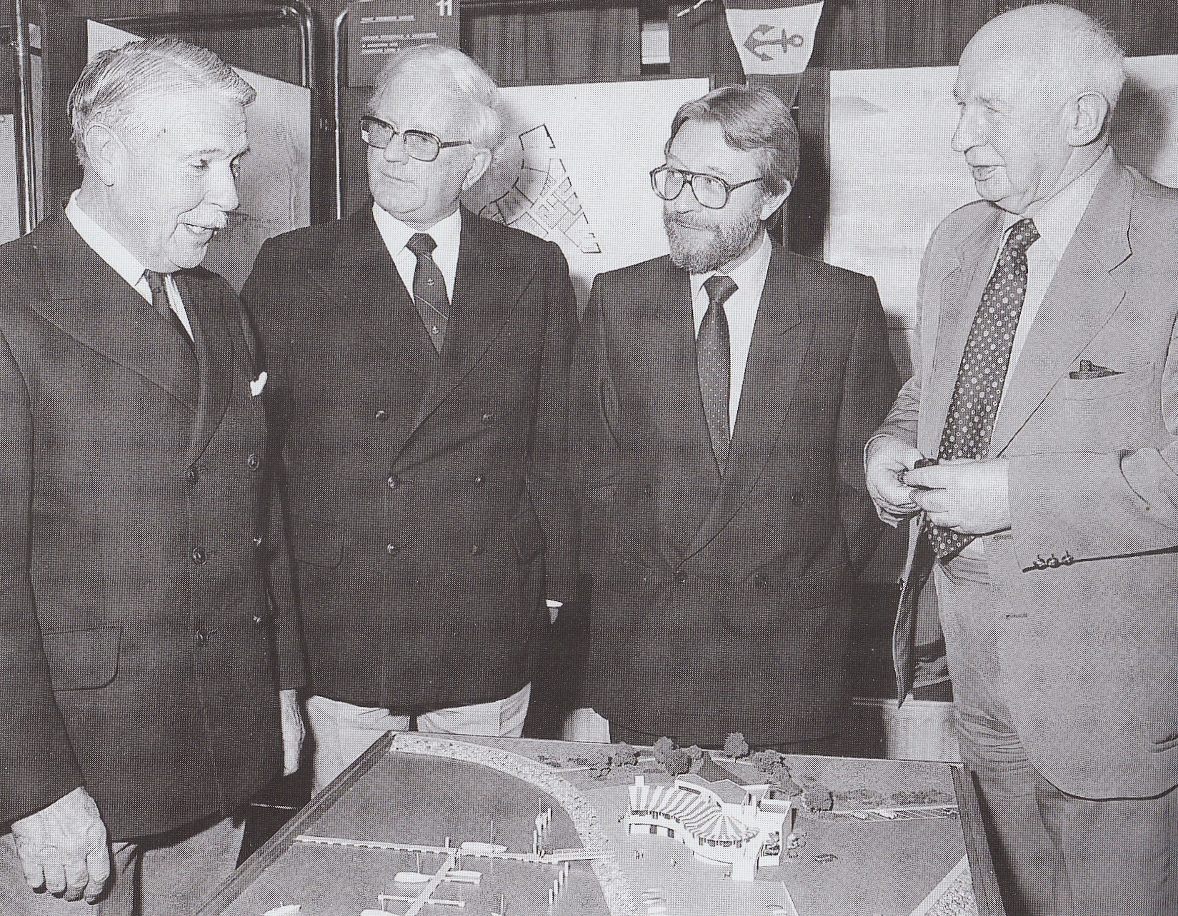 After the competition organised by the Royal Institute of Architects in Ireland for a new clubhouse design attracted 18 entries, the winning project was unveiled in November 1984. With the model of the proposed new building are (left to right) Bill Cuffe-Smith (Commodore Howth YC), architects Vincent Fitzgerald and Reg Chandler, and Martin D Burke, President of the RIAI.   