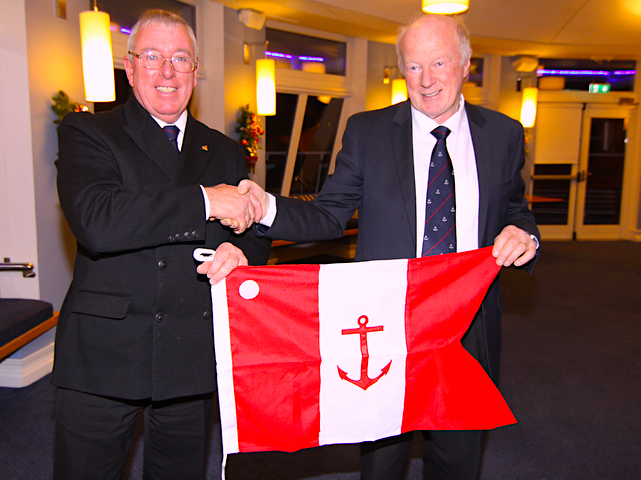 Vice Commodore Paddy Judge receives his flag