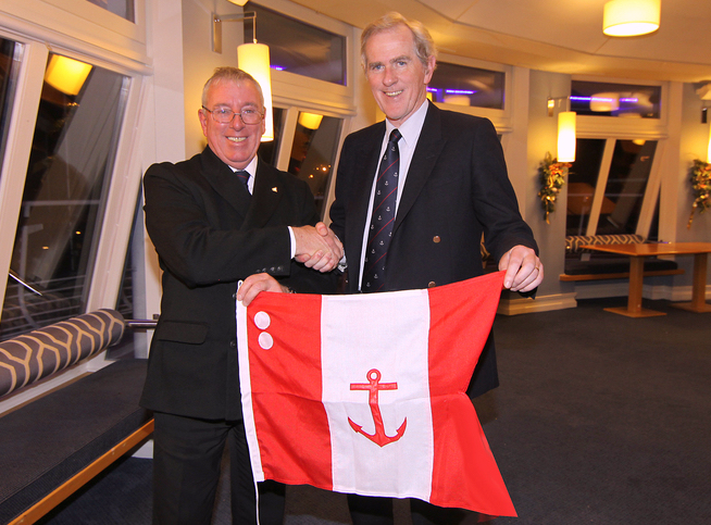 Rear Commodore Neil Murphy receives his flag