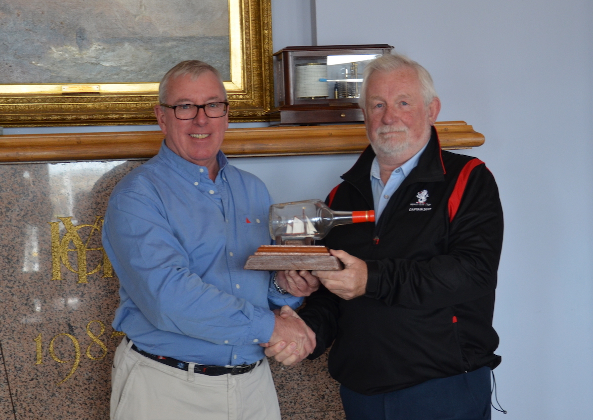 Ian Byrne Commodore presenting Michael O'Connor with the 2019 winning "Asgard " trophy for the Line Heaving Competition