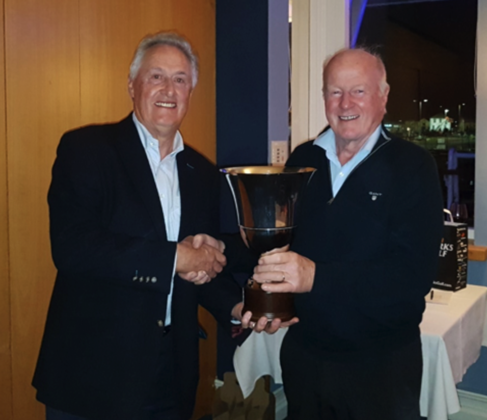 The Fulmar Cup is presented to Conor Holmes by IEGS Captain, Vice Commodore Paddy Judge