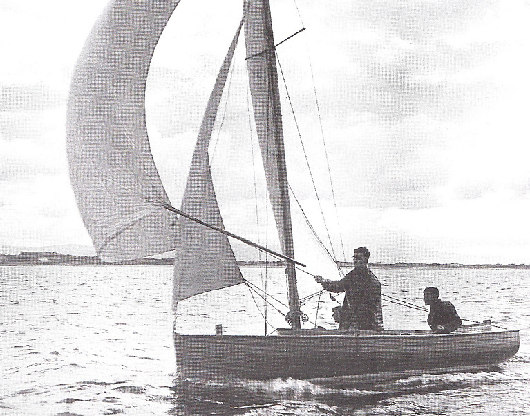 The Mermaid Elf with Neville on the helm, clear ahead as usual off Howth. At this period, Neville won the annual All-Ireland Helmsman’s Championship twice, in 1952 and 1954.