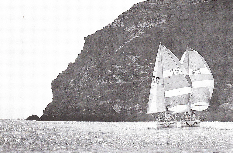 Glued together. Rapparee (Harry Byrne) and Demelza (Neville Maguire) chasing each other as they close towards the mark close off the north side of Howth Head.