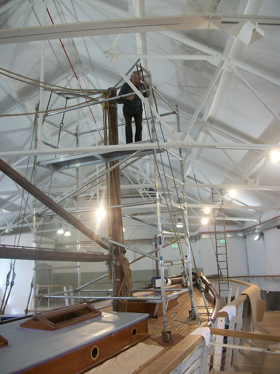 Man aloft. Neville Maguire - aged 87 - fitting Asgard’s display rig. Photo: Pat Murphy