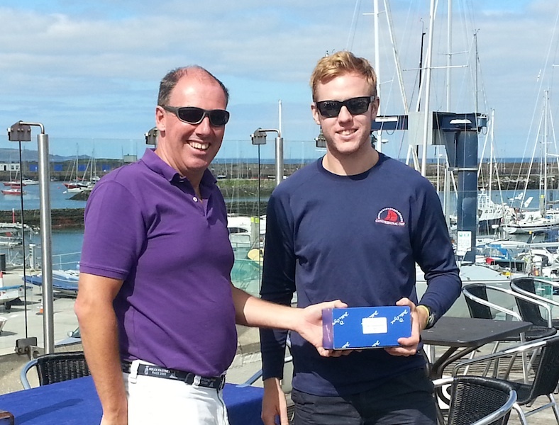 Simon Rattigan collects 3rd prize from Commodore Brian Turvey