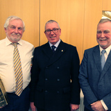 Ian_Byrne_(Commodore)_and_John_Connolly_awarding__Michael_O'Connor_Second_Prize_for_the_Photographic_Competition.jpg
