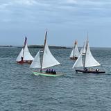 Orla (21) watches as the older boats start