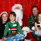 The Hanratty family - Kate, Shane, Carl and Grace with Santa