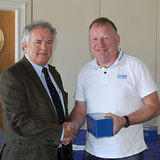 Vice_Commodore_Berchmans_Gannon_presents_Paddy_Kyne_(Maximus)_with_his_prize.jpg